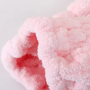 Soft pink coral fleece fabric detail of kids hair drying cap, highly absorbent and comfortable.