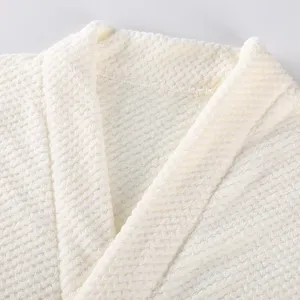White waffle weave bathrobe collar detail, soft textured fabric close up view for comfort sleepwear
