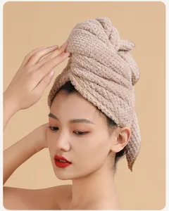 Soft coral fleece dry hair cap detail, highly absorbent and quick-drying towel wrap for daily care.