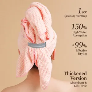 Coral fleece quick-dry hair towel cap with elastic fixing strap for women daily use.