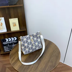 Casual canvas shoulder messenger bag for women with chic floral embroidery and pearl crown pendant.