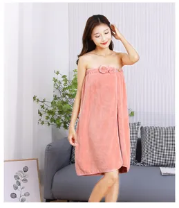 Thickened coral fleece wearable bath towel for women, soft and absorbent pink dress.