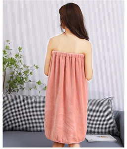 Thickened coral fleece wearable bath towel for women, soft absorbent bath skirt for home use.