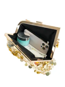 Gold sequin evening clutch bag, glamorous party handbag with metal frame and spacious interior.