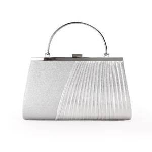 Silver glitter and pleated evening clutch bag detail view with elegant metal handle.
