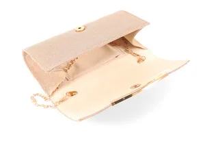 Close-up of glitter evening clutch showing interior pocket, gold chain and secure clasp.