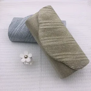 Glitter pleated evening clutch bag set, stylish metallic shoulder bag for women parties.