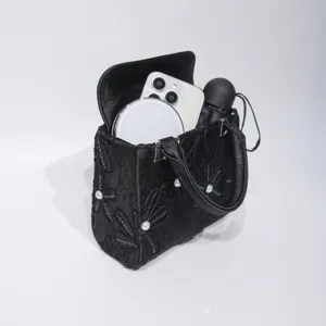 Black Chinese style embroidered handbag evening bag with pearl details and interior props