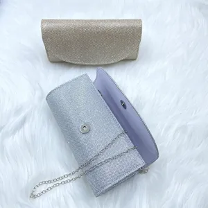 Glitter evening clutch bag for women, elegant flap shoulder bag with chain strap for banquets.