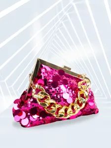 Pink sequin evening clutch bag detail, featuring shiny sequins and a chunky gold chain handle.