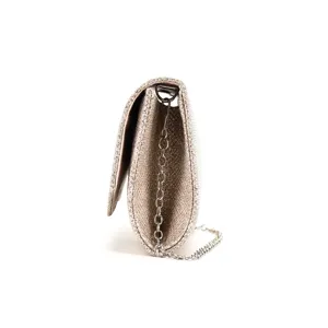 Elegant glitter evening clutch bag for women, stylish side view detail of chain strap.