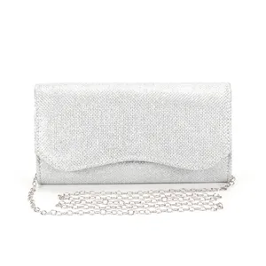 Silver glitter evening clutch bag detail, sparkling fabric with metallic chain strap.