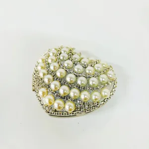 Stunning heart-shaped evening clutch bag adorned with pearls and rhinestones for women.