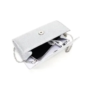 Silver glitter evening clutch bag detail showing interior space, chain strap and snap closure.