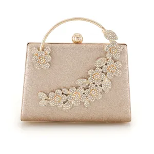 Elegant gold glitter evening clutch bag with sparkling rhinestone floral and butterfly decor.
