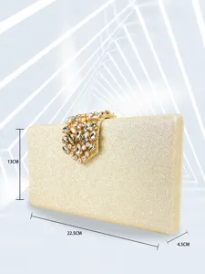 Gold glitter evening clutch bag with sparkling rhinestone clasp for women party dress banquets.