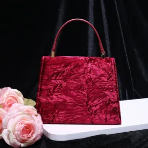 Elegant red velvet top handle handbag for women stylish shoulder tote bag classy evening purse.
