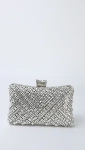 Detailed closeup of the sparkling silver rhinestone evening clutch bag with crystal design.