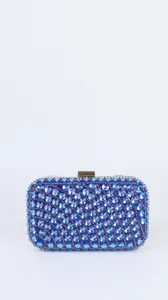 Close-up detail of the sparkling blue rhinestone crystal evening clutch bag metal clasp structure