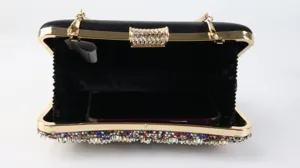 Black rhinestone evening clutch bag open interior detail showing spacious capacity for phone.