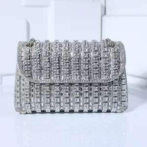 Elegant rhinestone evening bag with sparkling crystals and chic chain strap for party dress.