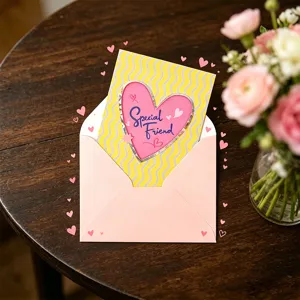Dopamine color greeting card detail view, pink envelope and cute heart design, ideal gift.