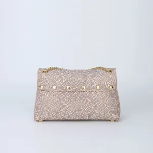 Detailed shot of the pink rhinestone evening shoulder bag with sparkling crystals and gold chain.