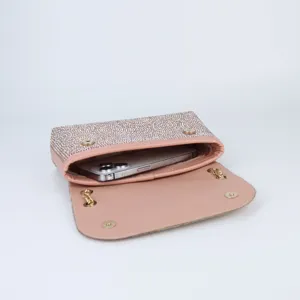 Elegant pink rhinestone evening shoulder bag with chain strap and phone capacity detail.