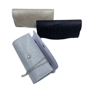 Elegant glitter evening clutch bag with chain strap, perfect for weddings and parties.