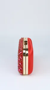 Red rhinestone evening clutch bag side view detail, elegant party purse for women.