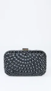 Detailed view of the black rhinestone evening clutch bag, elegant crystal party purse for women.