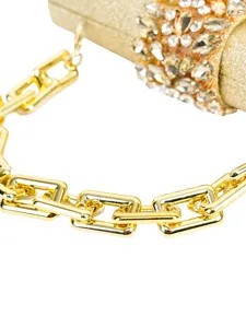 Golden rhinestone evening bag detail with chunky chain strap for luxury party events.