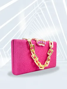 Pink glitter evening clutch bag with gold chain and sparkling crystal clasp for party.