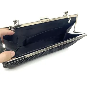 Elegant black pleated evening clutch bag with silver metal frame for women party and wedding.