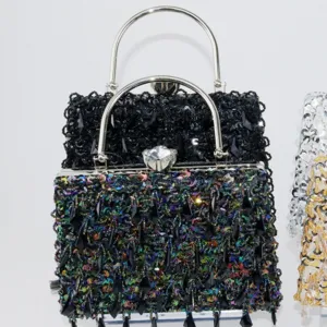 Elegant black sequin evening bag with metallic handle and crystal clasp for party and banquet events