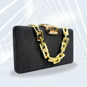 Elegant black glitter evening clutch bag for women featuring a luxury gold chain and gem clasp.