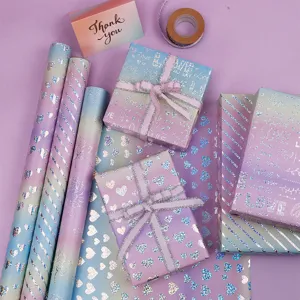 Gradient laser aluminum gift wrapping paper set with love heart and rose patterns for Valentine's Day.