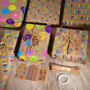 Gift wrapping paper set with birthday balloons stars candles and tags for party present packing.