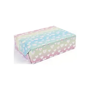 Holographic rainbow gradient gift wrapping paper with sparkling hearts for Valentine's Day.