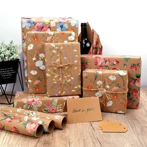 Kraft paper floral gift wrapping rolls with vintage botanical designs for festive present packaging.