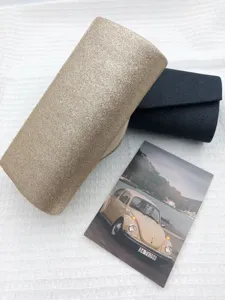 Glitter evening clutch bag for women, elegant party crossbody shoulder bag in gold and black.