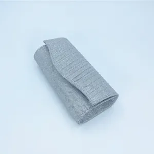 Silver glitter pleated evening clutch bag, elegant party shoulder bag for women details.