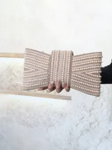 Elegant pearl beaded evening clutch bag for women, chic bow design shoulder handbag.