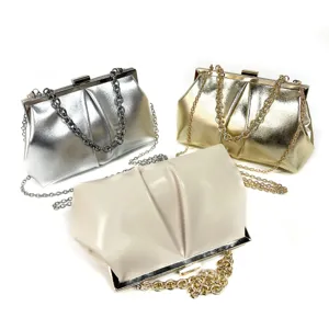 Elegant metal frame evening clutch bag with chain strap for women, stylish wedding party purse.