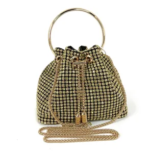 Luxury rhinestone evening bag with metal ring handle and chain strap for women parties.