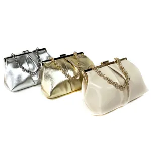 Metallic and PU evening clutch bags in silver, gold, and white with chain strap details.