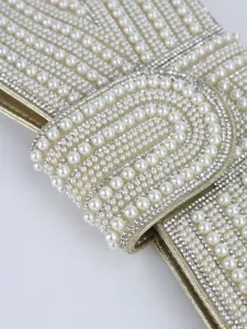Exquisite pearl rhinestone evening bag detail close-up luxury beaded clutch accessory