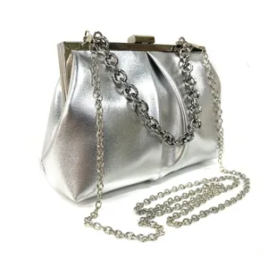 Silver metallic evening clutch bag with metal frame clasp and chic chain strap for party.
