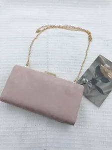 Elegant pink evening clutch bag with gold chain strap for women party weddings and events.
