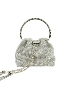 Silver rhinestone evening bucket bag with metal ring handle and chain strap for party.